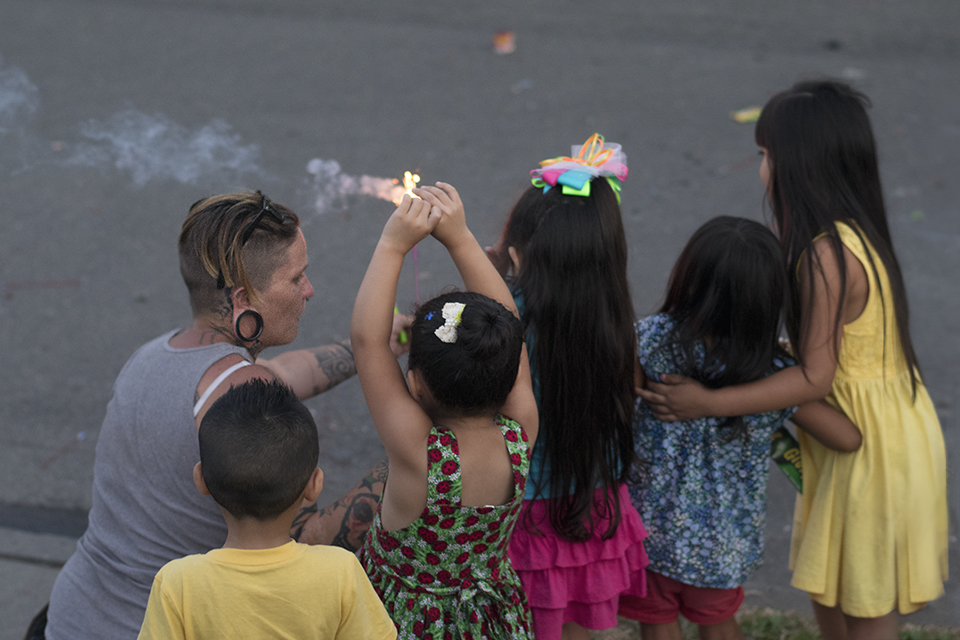 Barbie helping the girls with the sparklers