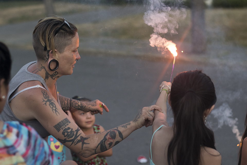 Barbie helping the girls with the sparklers